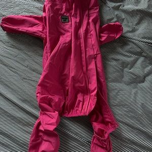 Dog slush suit, Canada Pooch. Black one is size 24 and pink one is size 22.